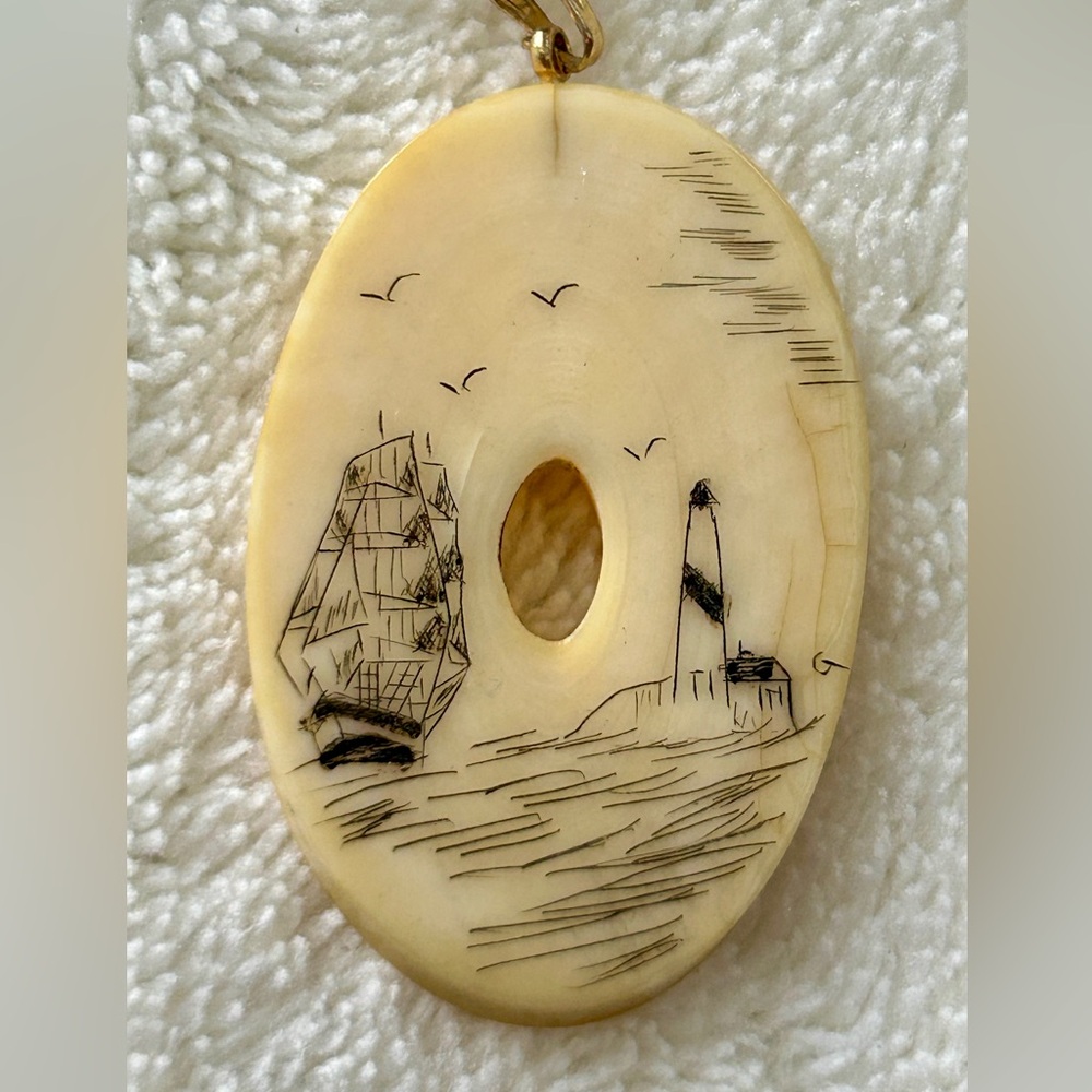 Scrimshaw Bone Pendant with Nautical Engraving on gold chain